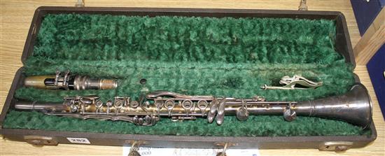 A Gladiator silver plated clarinet, cased